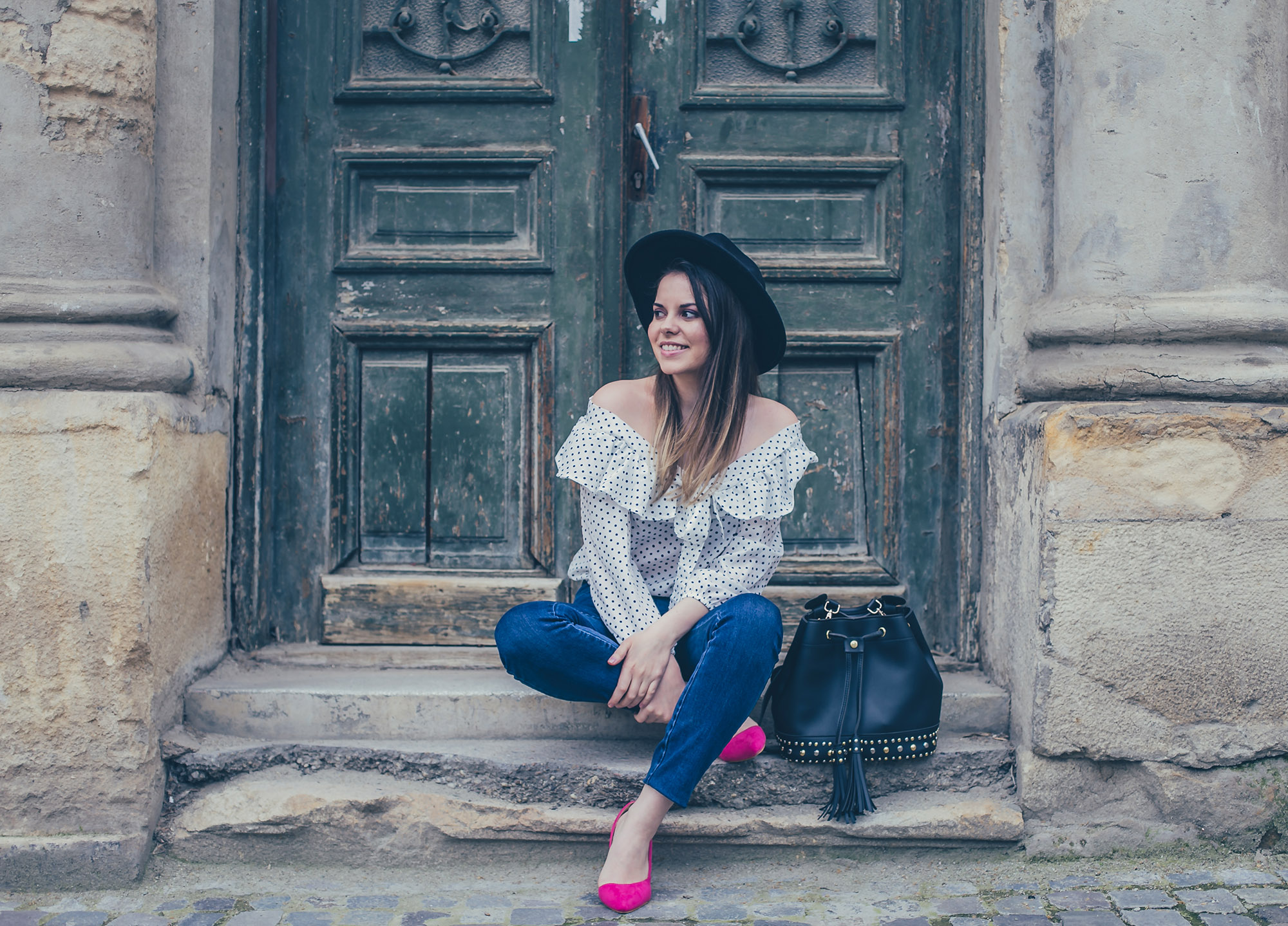 pink shoes and polka dot blouse and jeans