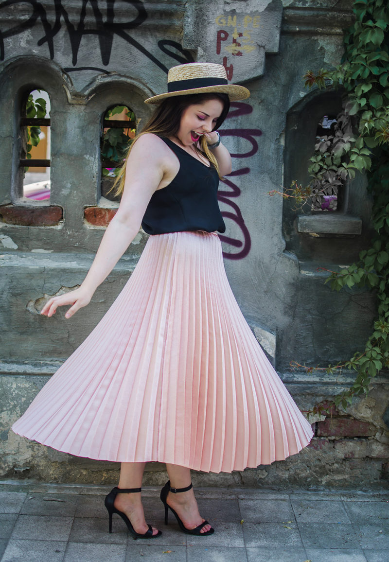 pink pleated skirt twirl