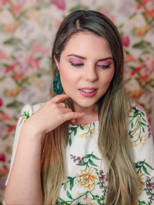 purple makeup with green eyeliner